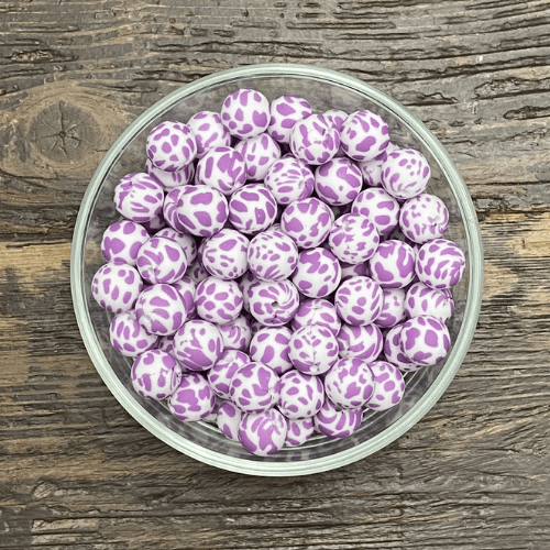 cow print (purple / white)