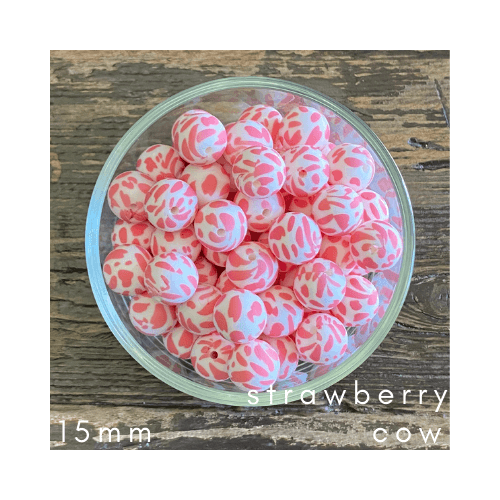 cow print (pink / white)