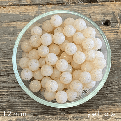 yellow glitter beads